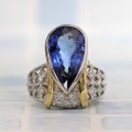 タンザナイト 7.18ct リング・指輪 8号 Pt900/K18・プラチナ/ゴールド 中央宝石鑑別書 【中古】 (249599)