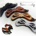ダブルリボンのラメラメバナナクリップ 〜優しい留め心地でしっかり留る！頭の丸みにしっかりフィット