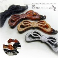 ダブルリボンのラメラメバナナクリップ 〜優しい留め心地でしっかり留る！頭の丸みにしっかりフィット