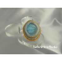 蜻蛉玉、水色とオレンジのブローチ